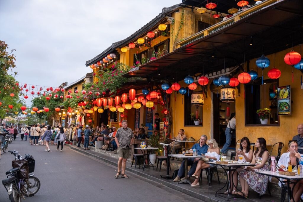 Southeast Asia Travel Guide
Festive outdoor café in Hoi An, Vietnam with colorful lanterns and street life ambience.