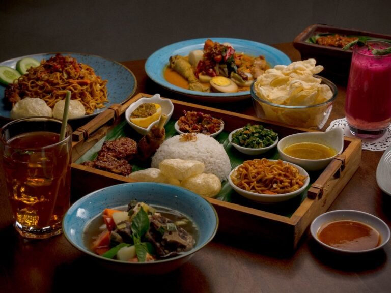 Food and culture travel guide scene featuring colorful local dishes at a bustling market table