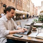 Digital nomad guide setup featuring a professional remote worker at an outdoor cafe