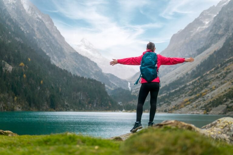 Solo Travel Solo travel adventure featuring an independent explorer overlooking a scenic landscape