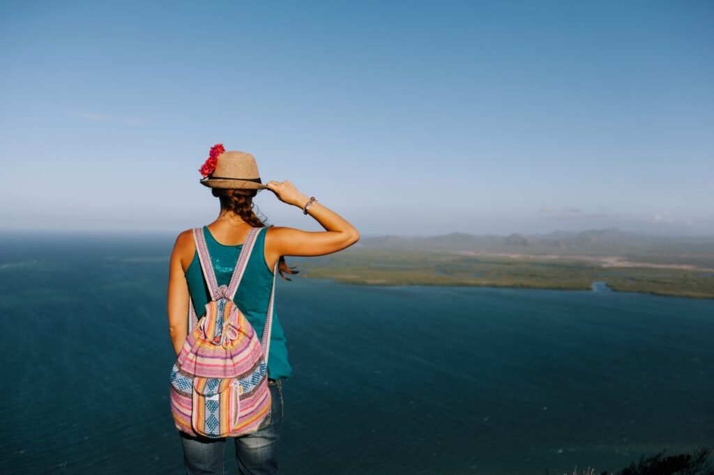 Solo travel
Solo traveler watching a vibrant ocean sunset representing personal growth and freedom